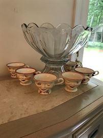 Cute "Winker" cups around a Heisey two-piece punch bowl from about 1920.