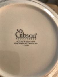 Mark on set of dishes on square coffee table