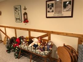 Bench with stuffed animals.  Babe Ruth memorabilia
