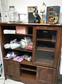 Cabinet is for sale, and displays other items being offered