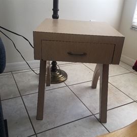 There are 2 of these end tables