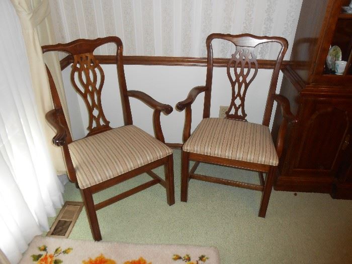 2 captains chairs matching  6 armless dining chairs