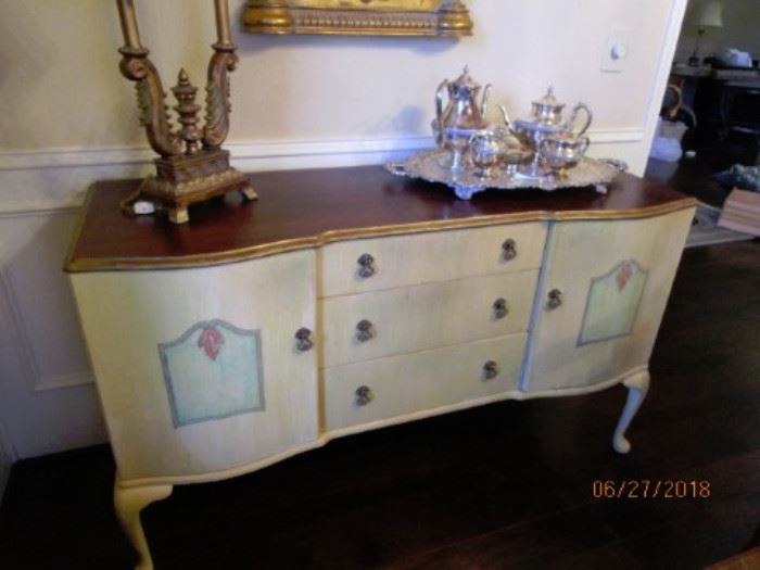 Side buffet in dining room.  3 drawers and 2 doors for easy access.