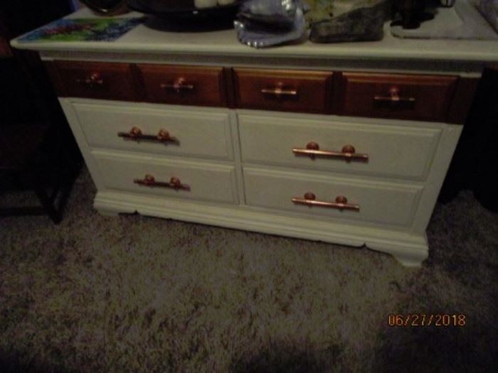 6 drawer chest.   Painted white and copper for an interesting look.  In good condition.  