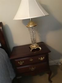 Bedside tables and crystal lamps.
