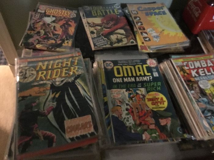 Lots of vintage comic books in sleeves.
