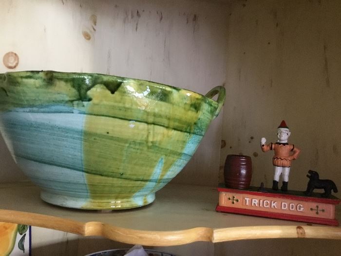 Pottery and a repro bank.