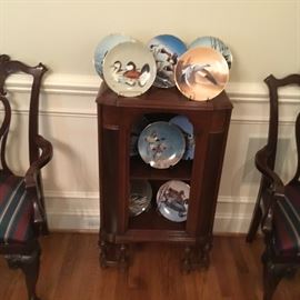 Duck plates and a great small vintage bookcase.