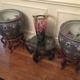 Phenomenal large blown glass vase plus a pair of large Chinese fish bowls on stands.