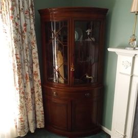one of a pair of 1940s-50s mahogany corner cabinets