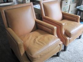 Two Leather Armchairs by Wesley Hall.