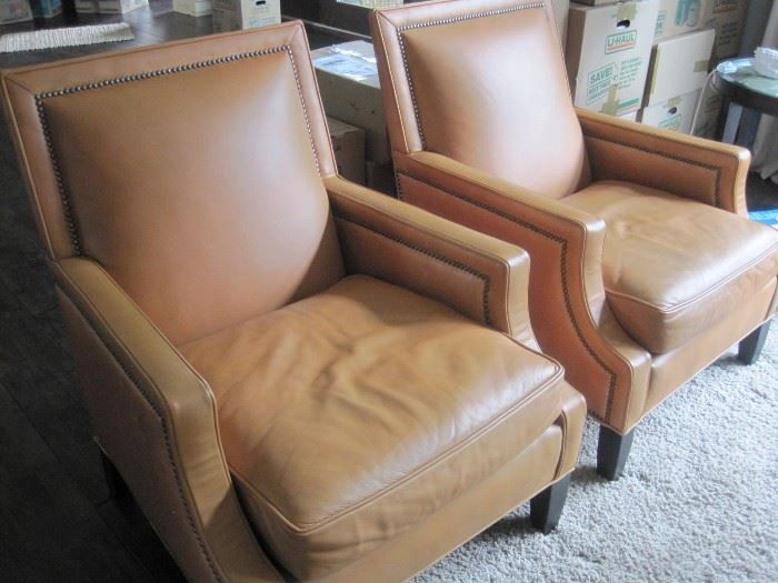 Two Leather Armchairs by Wesley Hall.