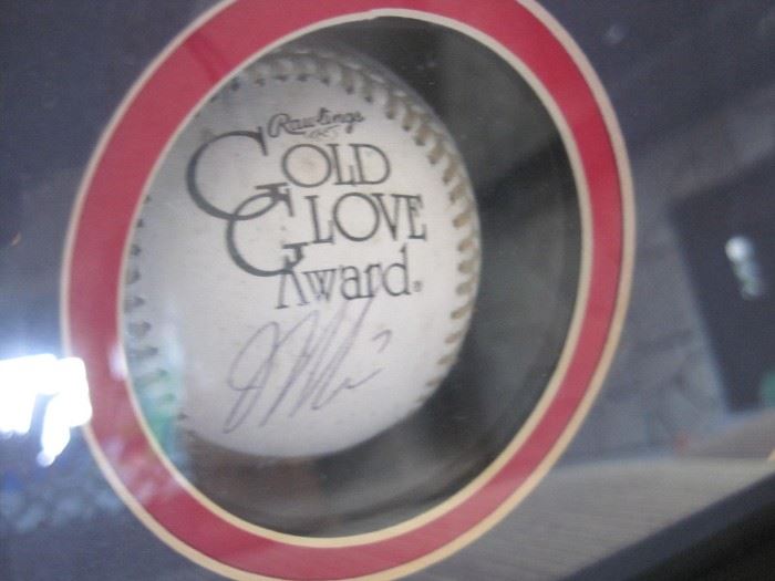 Joe Mauer signed Golden Glove Ball with photograph and certificate.