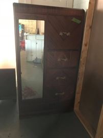 #24 antique armorie w 1 door and 4 drawers 34x19x62 $225.00