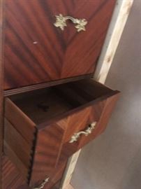 #24 antique armorie w 1 door and 4 drawers 34x19x62 $225.00