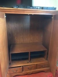 #40 oak entertainment center w 2 doors 51x27x67 $125.00