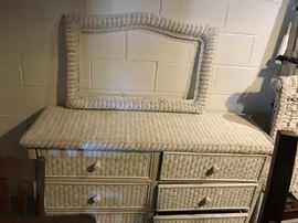 #79 white wicker dresser and frame for mirror36x24(missing mirror) 55x18x31 $125.00