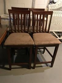 #80 table w/ 4 bar stools brown with suede like seat cushions 24" H $175.00