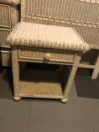 #82 white wicker bedside table 22x18x24 $75.00