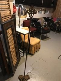#109 JS vintage brass hanging plant stand 56"H $75.00
NOTE: the hair washing chairs are not for sale.