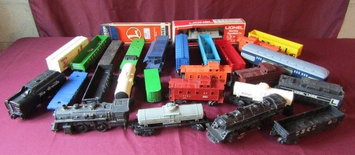 Toy Trains w/ track and boxes of parts.
