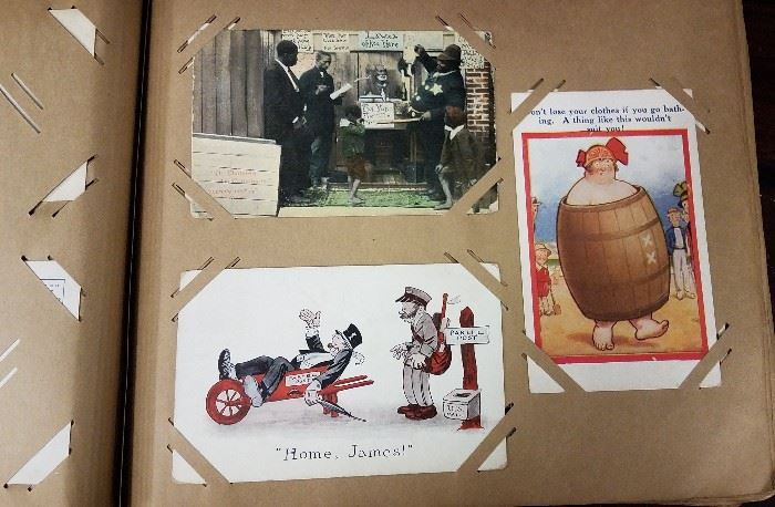Full photo album with vintage postcards