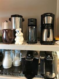 SEVERAL COFFEE MAKERS AND ENTERTAINING ITEMS 
