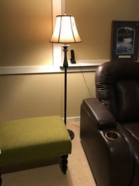 UPHOLSTERED OTTOMAN  AND A FLOOR LAMP