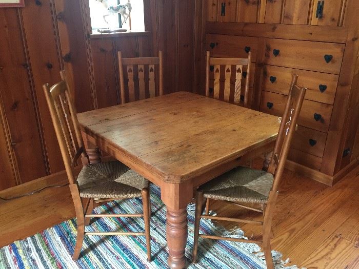 Farm Table - Pine - late 19th Century with heavy turned legs - Height 27" - top size 43" x 42"  ** Set of 4 Chairs are early 20th century solid wood with sweet heart design