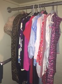 Closet full of designer women's clothing and shoes. Costume jewelry and handbags