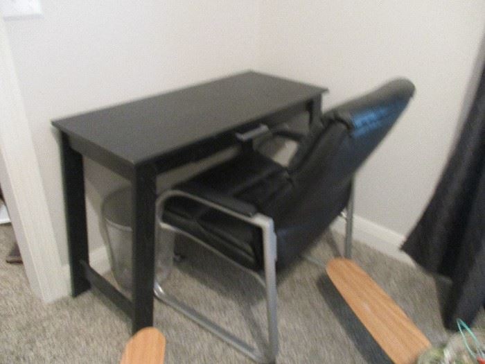 small desk and leather chair