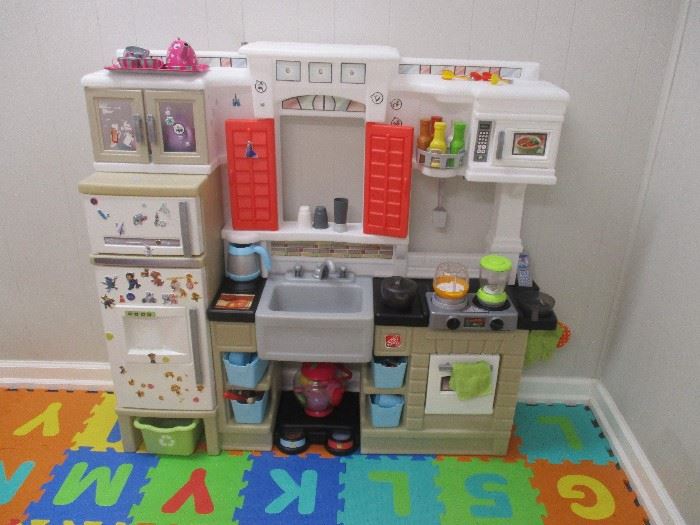 Very nice child's kitchen set with MANY extra pieces