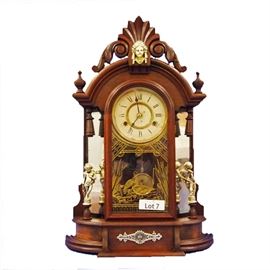 Lot 7 - Turn of the century Walnut New Haven Shelf Clock, "Occidental". 8 Day Time and Strike. 24 1/2" tall. 