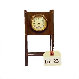 Lot 23 - Turn of the Century Brass American Novelty Clock, marked "8 Day". 8 day time only. 7 1/2" tall.
