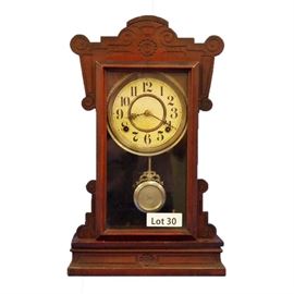 Lot 30 - Turn of the Century Walnut Waterbury Shelf Clock. 8 Day time and strike. 19 1/2" tall. 