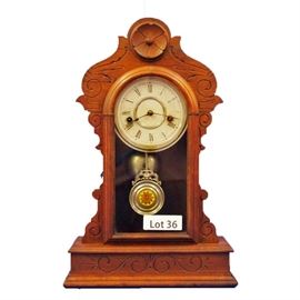 Lot 36 - Turn of the Century Walnut Shelf Clock. 8 Day time and strike. 18 1/2" tall.