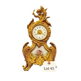Lot 45 - Turn of the Century Cast Metal and Porcelain New Haven Shelf Clock, unmarked. 30 hr. time only. 12" tall. 