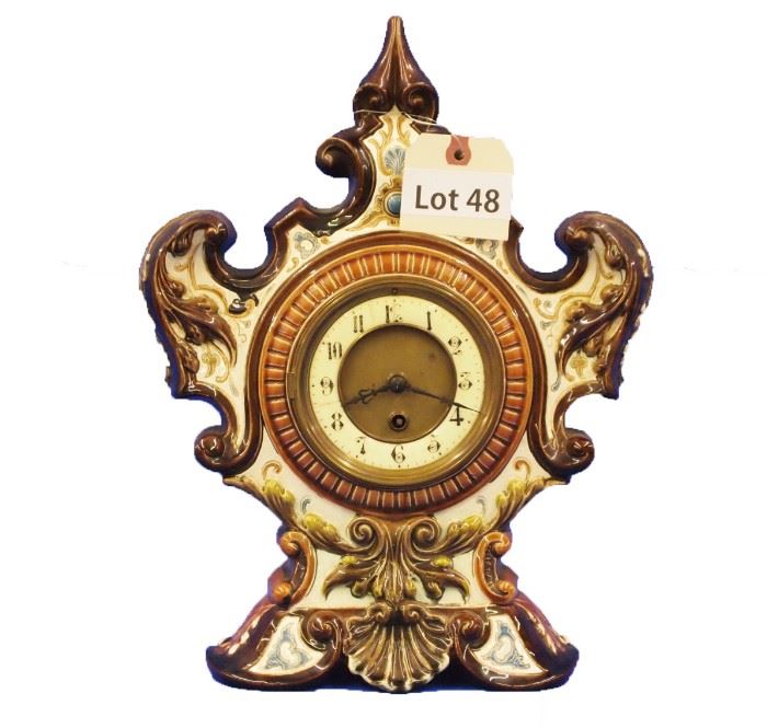 Lot 48 - Turn of the Century French Porcelain Shelf Clock. 8 Day time only. 15" tall.