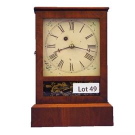 Lot 49 - 19th Century Mahogany Waterbury Cottage Shelf Clock. 30 hr. time only. 12" tall.