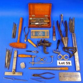 Lot 59 - Collection of Misc. and Watchmakers tools, hand pullers, ring sizers, engraving tools, swedge block, etc.