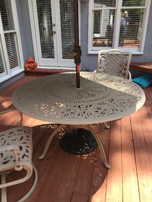 Wrought iron table with 2 chairs - built in lazy susan!