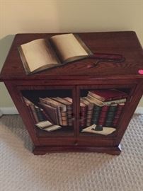 Small "book face" table. Measures about: 20" long, 10.5 Wide, 26" high
