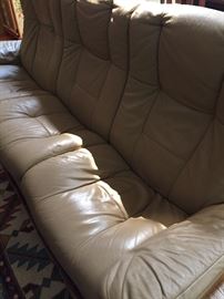Ekorne Stressless -  beige leather sofa - all 3 seats recline. Great for theater room.  Measures about: 90" long, 26" wide, 39" high. 