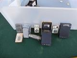 MANY ZIPPO LIGHTERS IN BOX