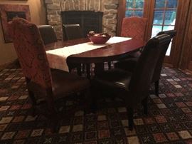 Oval table (some table top damage - name your price) and four leather chairs - set $100