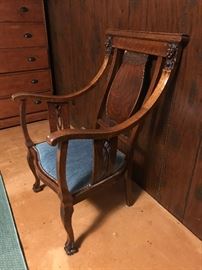 Lion arm chair – (handmade chair purportedly used in the ordination service of pastors in the Missouri Lutheran Synod)