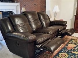 Italian leather sofa with recliners extended