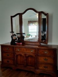 This dresser is part of a 4-piece Hickory White bedroom set