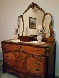Pair of vintage pink luster style lamps on beautiful depression era ornate dresser with mirror