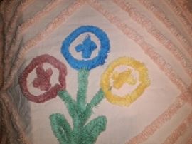 A closer look at the floral design on the Chenille bedspread